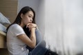 Depressed teenage girl sitting alone Royalty Free Stock Photo