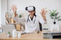 Lady medic looking into virtual glasses in modern office Royalty Free Stock Photo