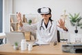 Lady medic looking into virtual glasses in modern office Royalty Free Stock Photo