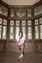 The lady in Middle Thai classical traditional dress suit posing indoor at old railway station building. Royalty Free Stock Photo