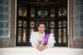 The lady in Middle Thai classical traditional dress suit posing indoor at old railway station building. Royalty Free Stock Photo