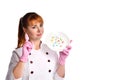 Lady, nurse or doctor, in medical suit and pink disposable gloves. Holding plate with colorful pills, posing isolated on white Royalty Free Stock Photo