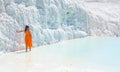 Lady in orange dress posing for photo at Pamukalle n Turkey