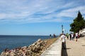 Lady on a path by the Adriatic sea at Rovinj Royalty Free Stock Photo