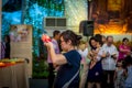 A Lady Performing Ritual During Vesak Day