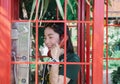 Lady phone in red public telephone booth Royalty Free Stock Photo