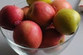 Lady pink and green apples in bowl in copenhagen denmark