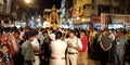 lady police commander standing on a group during Hindu religious festival road show