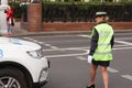 Lady police woman traffic control officer working on the road