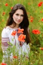 Lady in the poppies field Royalty Free Stock Photo