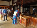 Lady praying in Kiyomizu Temple, Kyoto, Japan