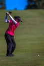 Lady Pro Golfer Top Swing Royalty Free Stock Photo