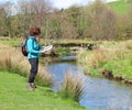 Lady Rambler climbing over a Stile Royalty Free Stock Photo
