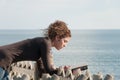 Lady reading a book at the seaside Royalty Free Stock Photo