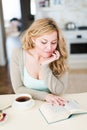 Lady reads an interesting book Royalty Free Stock Photo