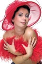 Lady in red hat embrassing herself Royalty Free Stock Photo