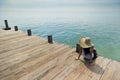 Lady relaxing at the dock Royalty Free Stock Photo