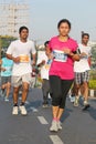 Lady running at Hyderabad 10K Run Event, India