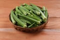 Lady\'s finger or Okra with wooden background Royalty Free Stock Photo