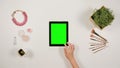 Lady`s Finger Scrolling on the Green Touchscreen