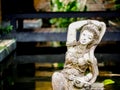 Lady sculpture in a Bali style garden Royalty Free Stock Photo