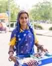 Lady selling arts and crafts in India