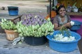 A lady selling flowers outside the Kataragama Temple in southern Sri Lanka.