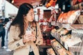 Lady shopping at the local specialty vendor