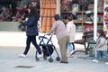 A lady with stroller in the streets of Estepa 2 Royalty Free Stock Photo