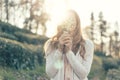 Lady in the sunlight with a bouquet