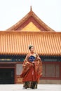 Lady taking costume portraits in the Forbidden City