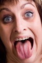 Lady with tongue out Royalty Free Stock Photo