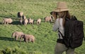 Lady Tourist with Binoculars on Safari Looking at Elephants Royalty Free Stock Photo