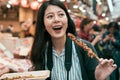 Lady tourist eating local specialty street food