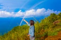 Lady try to catch the rainbow on Pha Hin Dum viewpoint Royalty Free Stock Photo