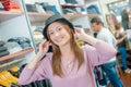 Lady trying on hat