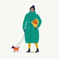 Lady walking with dog carry a Christmas box. Merry Christmas and Happy New Year.