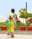 Lady walking with traditional costume india