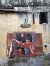 Lady waving her handkerchief. Beautiful street art / graffiti in Chinatown Kuala Lumpur.