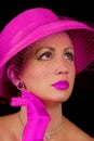 Lady wearing fuchsia retro hat and Purple Eyes