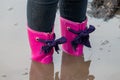 Lady wearing pink wellies Royalty Free Stock Photo