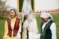 Lady wears traditional Kazakh wedding dress in Almaty, Kazakhstan.