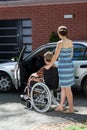 Lady on wheelchair before driving