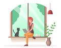 Lady on window with view to trees. Woman with computer sitting on windowsill with pet and houseplant