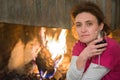 Lady, wine, fireplace Royalty Free Stock Photo