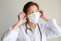 Lady or woman doctor wear the medical mask to protect infection from germ, bacteria,, corona , sars , influenza virus