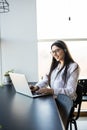 Lady work in call center and make notice in book Royalty Free Stock Photo