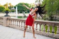 Ladyboy tattooed transgender model is dancing in the green park Royalty Free Stock Photo