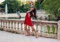 Ladyboy tattooed transgender model is dancing in the green park Royalty Free Stock Photo