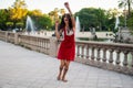 Ladyboy tattooed transgender model is dancing in the green park